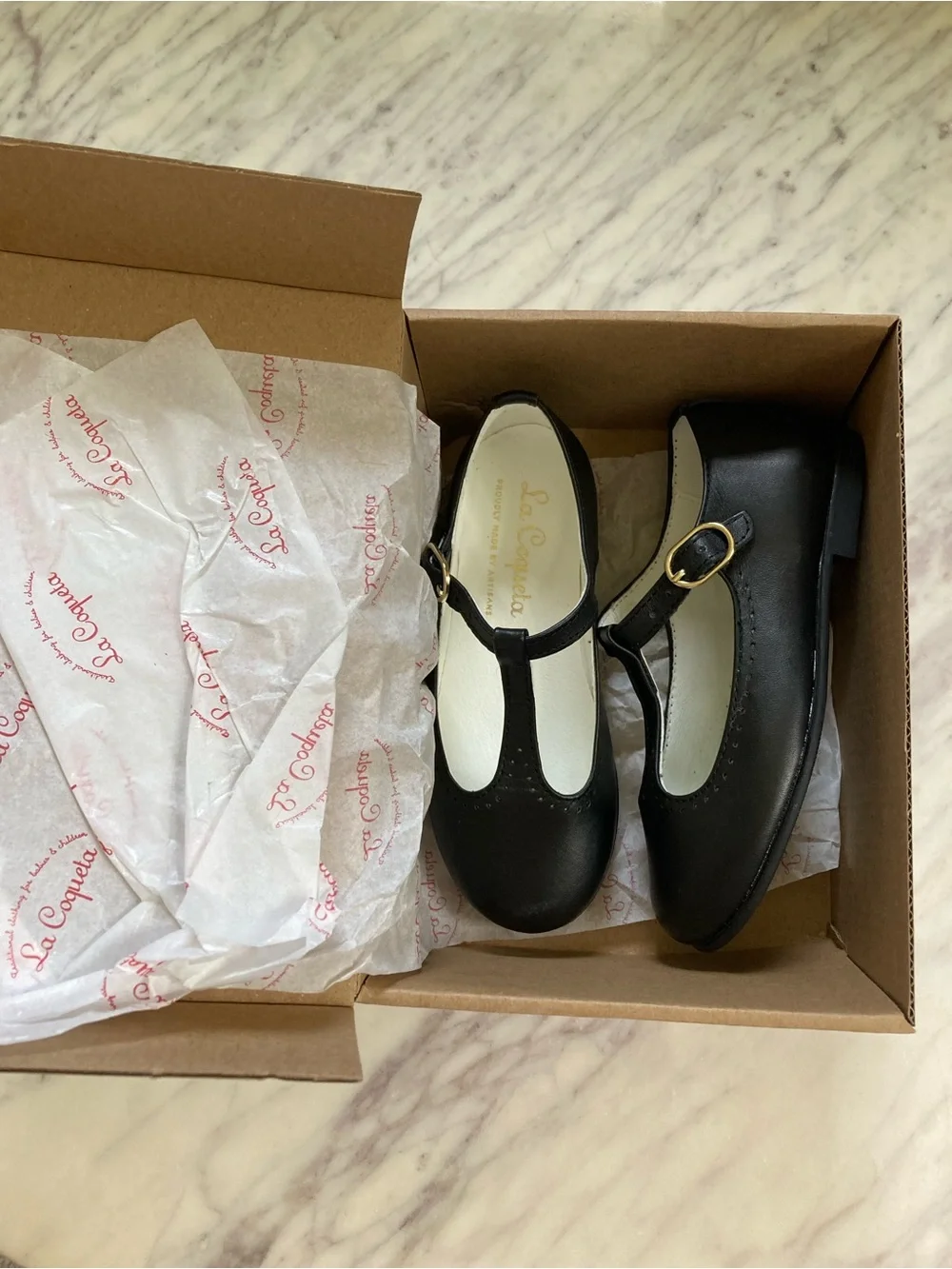 La Coqueta Black T-Bar Leather Shoes